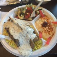 Rice Combo · Your choice of falafel with tahini, chicken with tahini or gyro with tatziki served over ric...