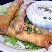 Borek · Sigara boregi. Feta cheese and parsley rolled in filo and fried. 4 pieces served with Olive ...