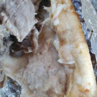 Italian Beef Sandwich · Sliced thin and piled high on Italian bread.