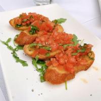 Bruschetta · Vegetarian. Toasted baguette with fresh garlic, fresh diced tomatoes ＆ basil.