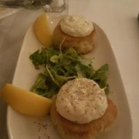 Crab Cakes · Pan seared blue lump crabmeat served with tartar sauce.