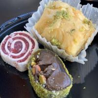 Turkish Delights · Assortment of Turkish sweets. Flavors vary, contact the restaurant for availability.