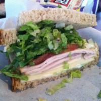 Tapp Sandwich · Turkey, avocado, pepperoni, provolone, lettuce, tomato, onion, and mayonnaise.