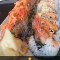 Hungry Roll · Shrimp tempura, salmon tempura, eel, avocado, crabmeat, and cucumber.