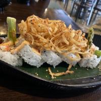 Cowboy Roll · Steak, crabmeat, avocado, cucumber, spring mix, and panko fried onions.