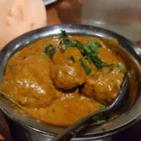 Lamb Korma · Cubes of lamb cooked with cashew and onion sauce.