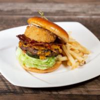 Pub Burger · 1/2 lb. charbroiled beef, hickory-smoked bacon, beer-battered onion ring, cheddar cheese, le...