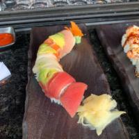 Rainbow Roll · Cucumber, avocado, imitation crab meat. (Top) Bluefin tuna, salmon, tilapia, avocado, and wh...