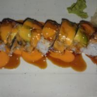 Tiger Roll · Inside: shrimp tempura. Outside: Unagi, avocado, teriyaki and house sauce with sesame seeds.