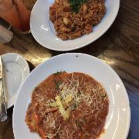 Jambalaya · Spicy blend of shrimp, andouille sausage, mushrooms and our homemade tomato herb sauce. Serv...