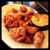 Alligator Voodoo · Farm raised alligator bites and deep fried.