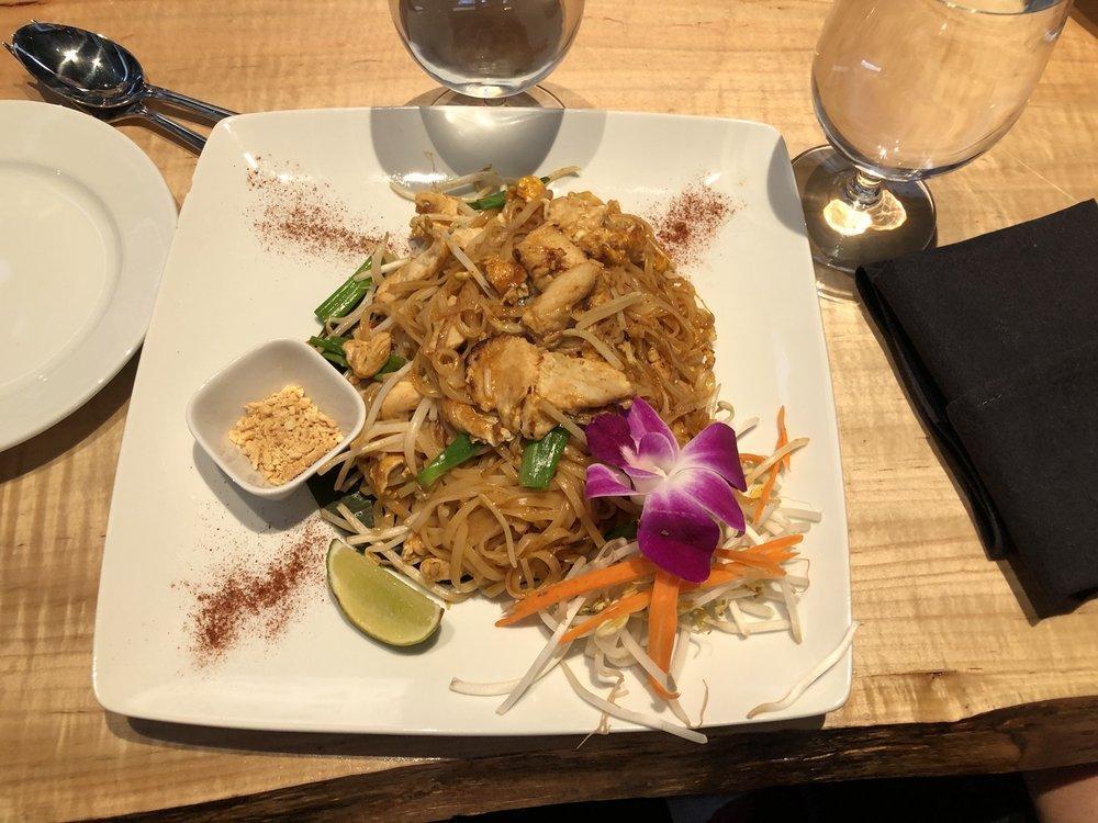 Pad Thai · Stir fired thin rice noodle with pad Thai sauce, bean sprouts, green onions, and egg with side of peanut and slice of lime.