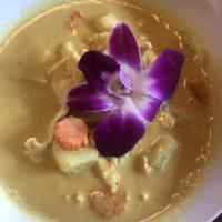 Yellow Curry · Flavored with red chili paste with addition of yellow curry powder with coconut milk, tossed...