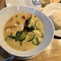 Green Curry · Traditional Thai green curry with coconut milk, eggplants, bamboo shoots, green & red bell p...