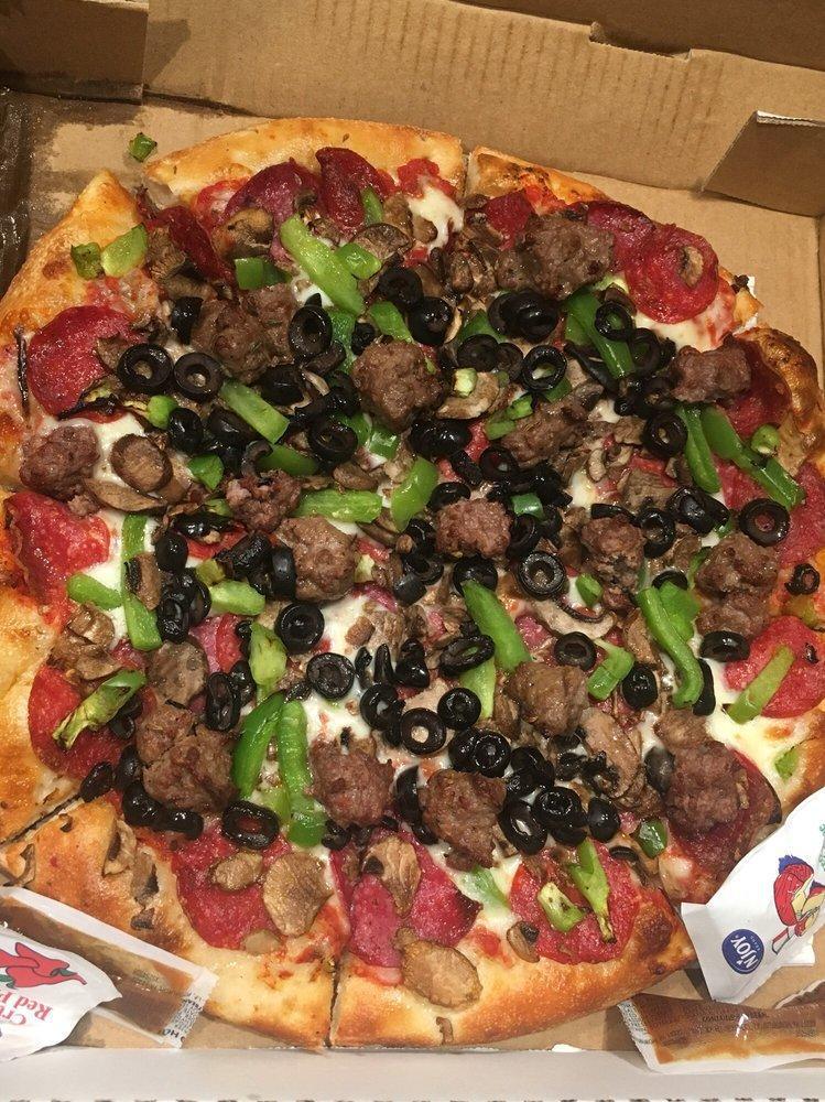 Combination Pizza · Tomato sauce, mozzarella cheese, salami, pepperoni, fresh mushrooms, green peppers, black olives, ground beef, Italian sausage.