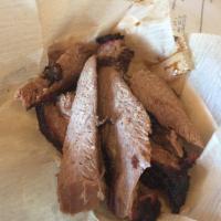 Beef Brisket · Award-winning for a reason: smoked for up to 18 hours and always carved to order