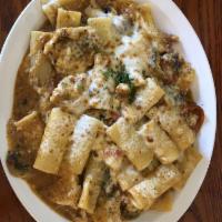 Chicken Riggies · Our version of the classic dish with a garlic mushroom wine sauce seasoned with prosciutto, ...