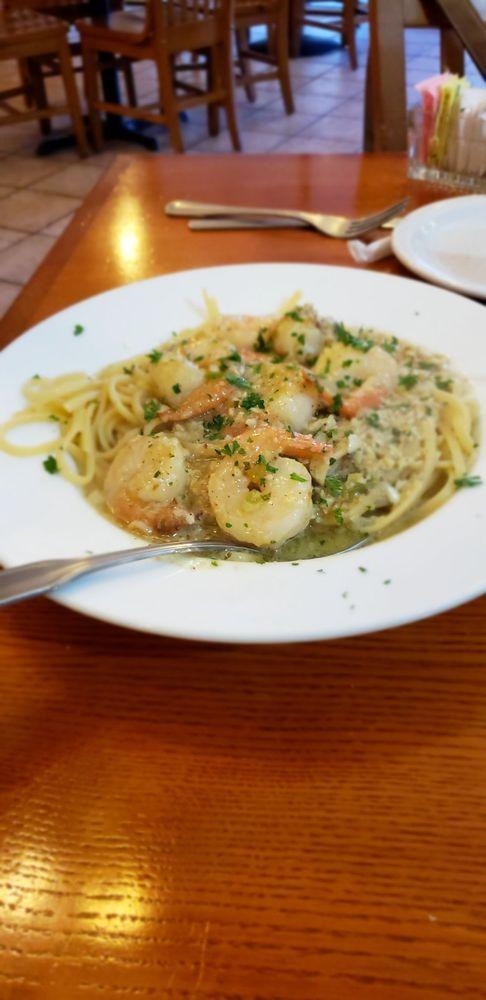 Shrimp Scampi · White wine sauce with lemon, butter and garlic and served over linguine.