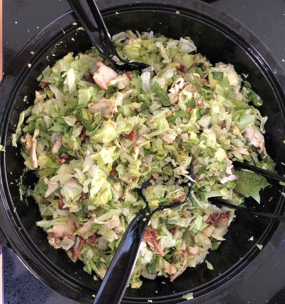 Chopped Salad · Romaine blend, grilled chicken, bacon, bleu cheese, avocado, tomato, green onion, and house vinaigrette.