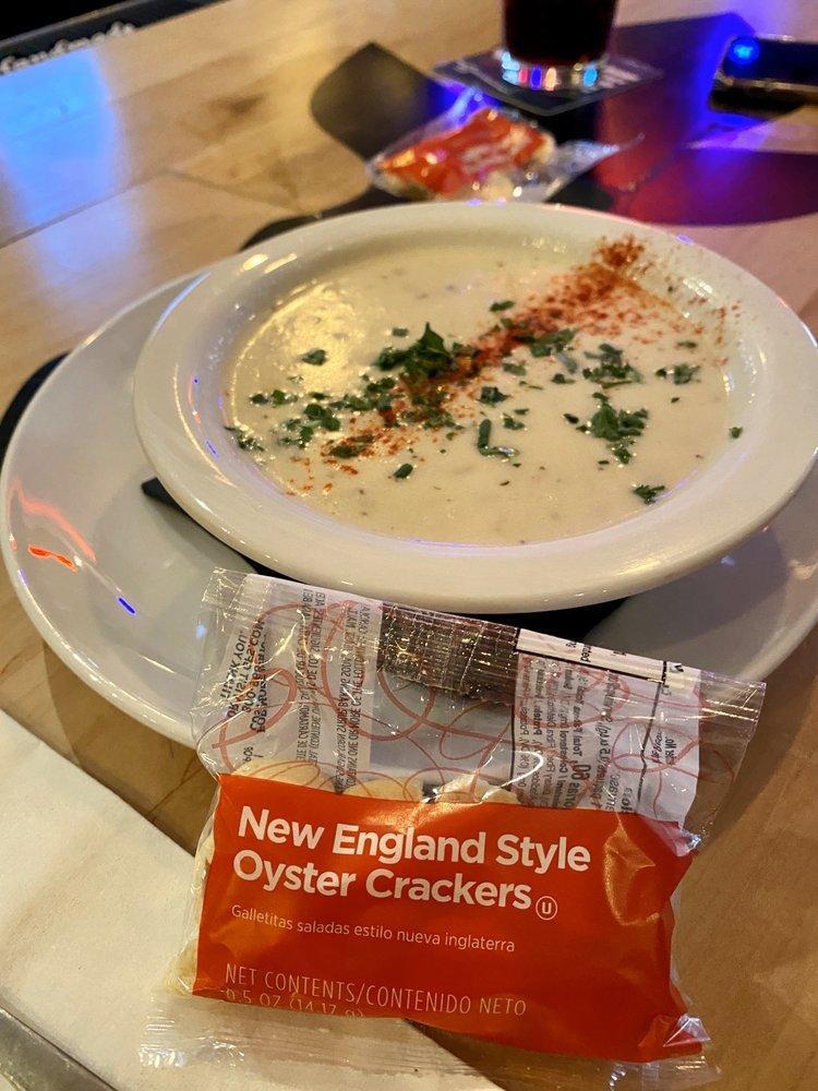 Clam Chowder · House made creamy New England clam chowder with chopped clams, potatoes herbs and spices.