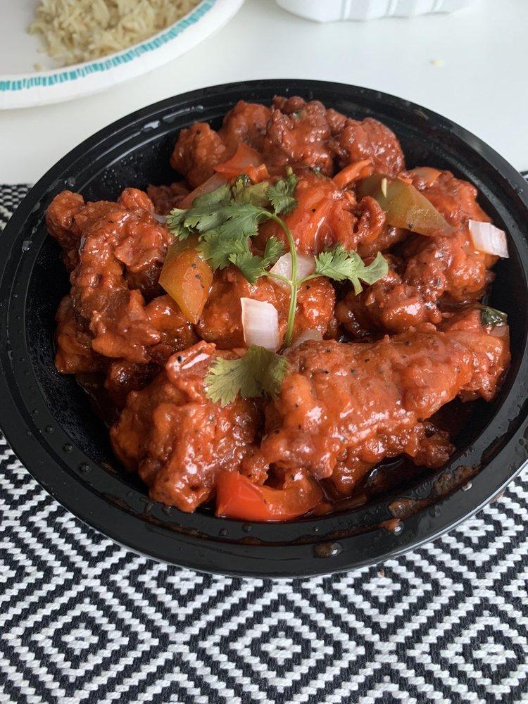 Chili Chicken · Chicken cubes sautéed with onions, bell peppers and green chilies.