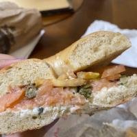 Smoked Salmon · Smoked salmon, plain cream cheese, tomato, red onion, and capers on a plain bagel.