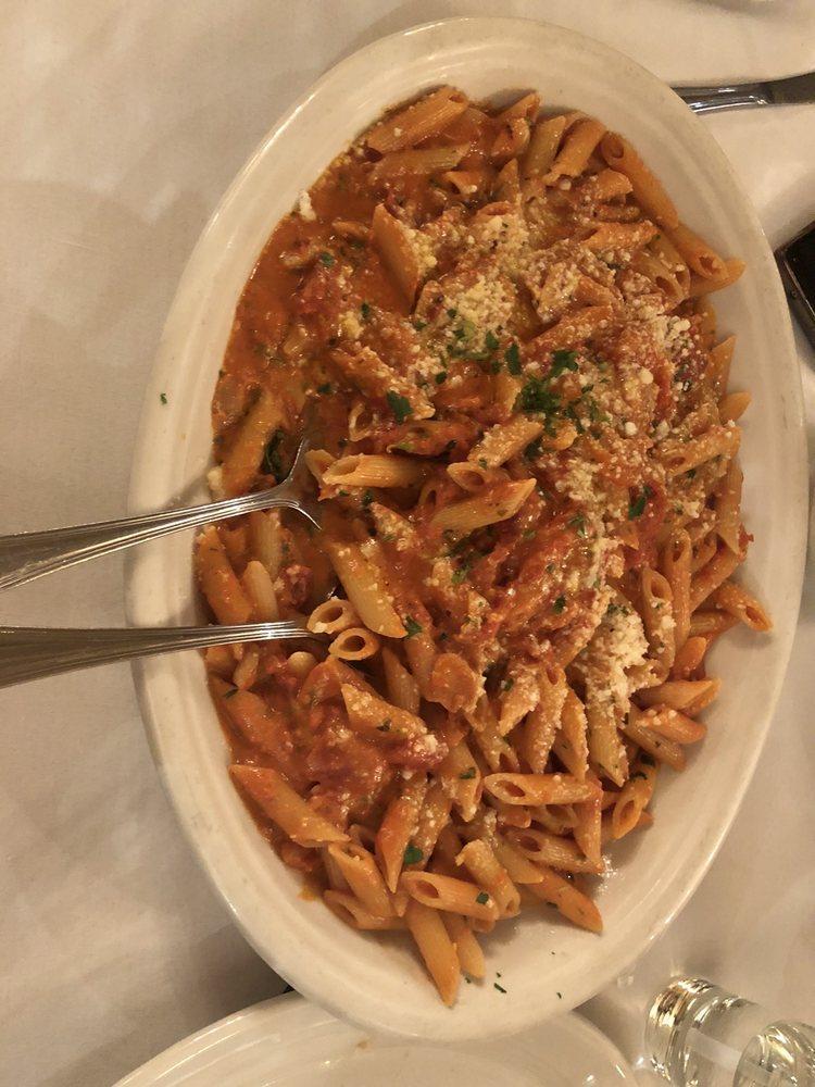 Penne Alla Vodka · Chopped Plum Tomatoes Combined w/ Cream, Romano Cheese, Sauteed Onions, Garlic & Crushed Red Pepper Flakes