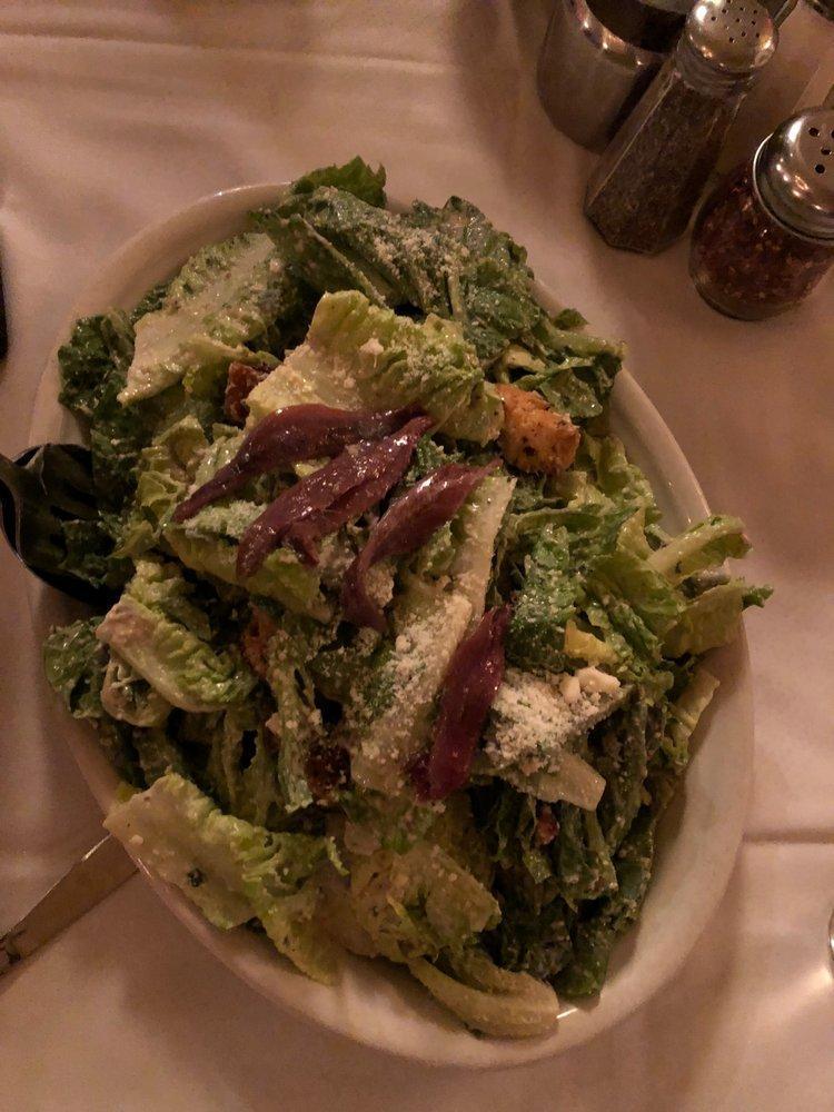 Caesar Salad · Romaine Lettuce, Parmesan Romano Cheese, Homemade Garlic Croutons - House Made Caesar Dressing on the Side