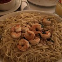 Shrimp Scampi · Shrimp Broiled & Topped w/ Garlic Breadcrumbs Served in a Garlic, Clam Juice, Olive Oil & Sw...
