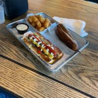 Downtown Dog · Smoked bacon wrapped dog, caramelized onions, pickled peppers, mayo, mustard, and ketchup. S...