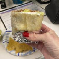 Super Burrito · Choice of meat, rice, beans, mild salsa, sour cream, guacamole and cheese.
