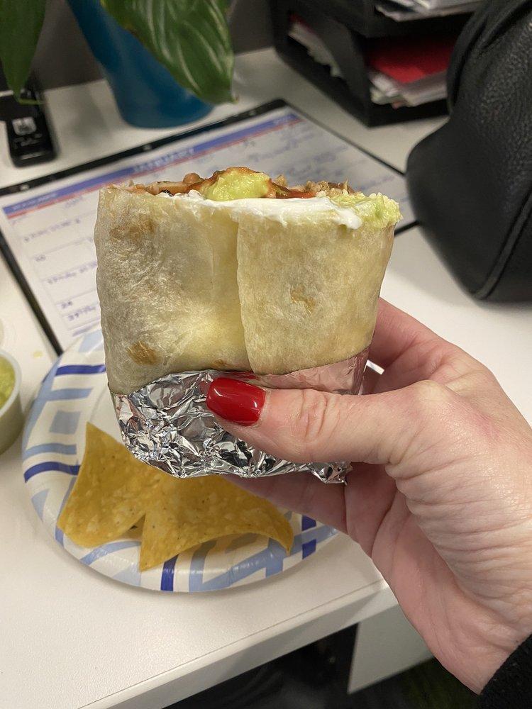 Super Burrito · Choice of meat, rice, beans, mild salsa, sour cream, guacamole and cheese.