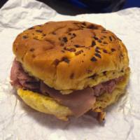 Super Roast Beef Sandwich · Large portion of delicious hand cut roast beef on an onion roll.