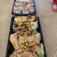 Diablo Roll · Spicy crunchy lobster salad and avocado inside, topped with white tuna and eel with spicy ma...