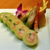 Naruto · Thin sliced cucumber wrapped with crab meat, avocado and tobiko.