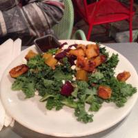 Kale Salad · Local beets, pumpkin seeds, goat cheese, and baked Migas.
