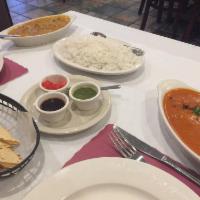 Lamb Tikka Masala · Boneless marinated lamb roasted and folded into a rich creamy sauce and spices. Served with ...