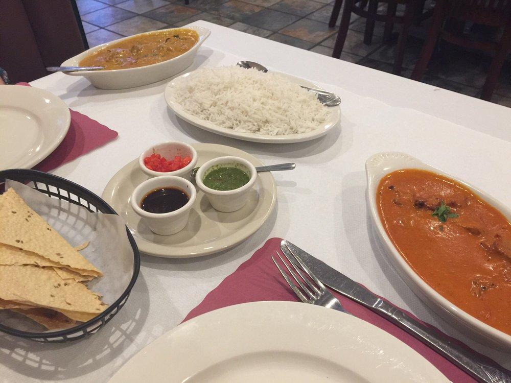 Lamb Tikka Masala · Boneless marinated lamb roasted and folded into a rich creamy sauce and spices. Served with rice.