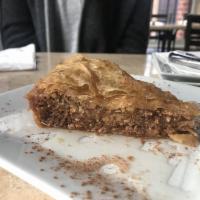 Baklava · Filo pastry filled with chopped nuts soaked in honey syrup.