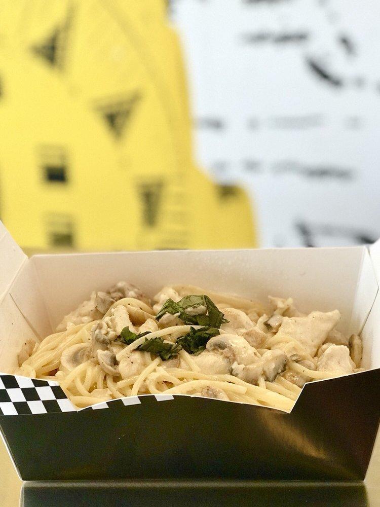 Chicken Alfredo Pasta · Sauteed tender chicken strips and black olives tossed in a smooth and creamy white sauce.