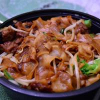 Beef Chow Fun · Stir-fried flat rice noodles with bean sprouts and yu choy.