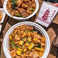 Kung Pao · Choice of meat stir-fried with scallions, show peas, zucchini, yellow squash and peanuts in ...