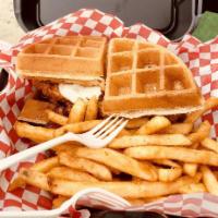 Original Chicken and Waffle Sandwich · Our famous chicken and waffle sandwich comes with chicken breast dipped in syrup with bacon ...
