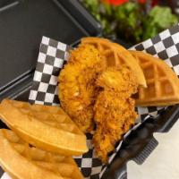 Chicken and Waffle Plate · 1 Belgian waffle, two buttermilk chicken tenders with a side of syrup