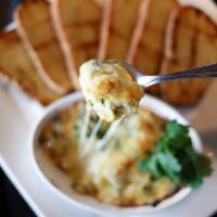 Parmesan Artichoke Dip Platter · By the pint, served with crostini.