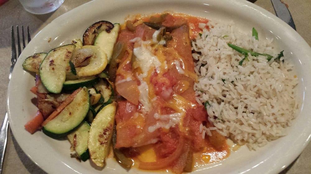 Cheese Enchiladas · Topped with chile con carne, served with rice and beans.