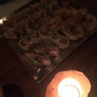 Dragon Maki · Shrimp tempura, cream cheese, unagi, avocado, roe, spicy mayo and eel sauce. 