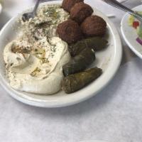 King Vegetarian Combination · Veggie falafel, humus, baba ganouj and grape leaves. Vegetarian. 