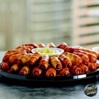 Mini Dog Pack · 20 all beef Dietz and Watson mini dogs wrapped in our crisp pretzel crust. Perfect for any d...