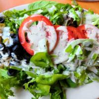 Este Salad · Mixed Greens with Red Onion, Green Pepper, Tomato, Black Olive, Sunflower Seeds and Golden R...